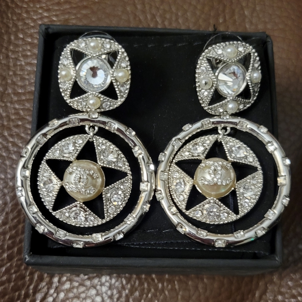 Silver earrings/pins
